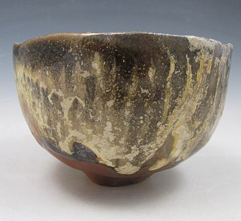 "Leopard" teabowl, Anagama fired, Temoku and yellow matte glaze 2.75t x 3.75w         $50